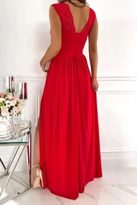 Detail of red sleeveless maxi dress showing back lace patchwork and deep V-neckline