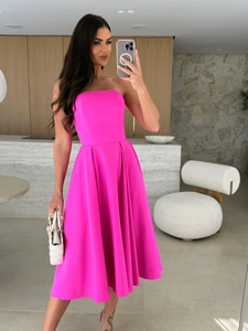 Detail of rose pink strapless A-line midi dress with smooth textured fabric for summer