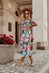Detail of floral off-shoulder summer dress with ruched waist and ruffled neckline