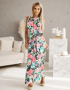 Detailed look at the vibrant floral pattern and halter neckline of the summer maxi dress