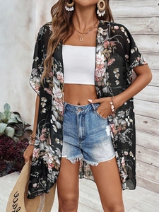 Detail of floral print chiffon cover-up with lightweight fabric for beach vacation