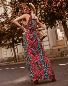 Detail of bohemian halter neck dress with geometric patterns and backless design