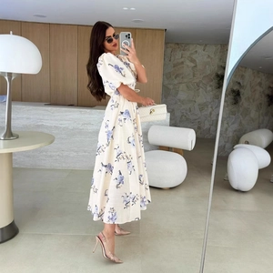Elegant floral puff sleeve midi dress with V-neck and A-line silhouette in cream white