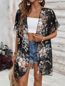 Detail of floral print chiffon cardigan showing breathable fabric and bohemian style