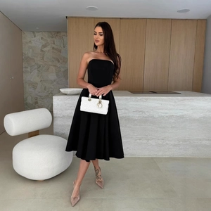 Elegant strapless black A-line midi dress for women, ideal for parties and social events
