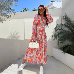 Floral print V-neck maxi dress in pink with long sleeves and button front design