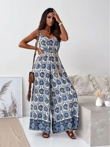 Detail of bohemian paisley print on V-neck wide leg jumpsuit with woven belt