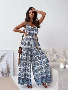 Detail of V-neck wide-leg jumpsuit with blue paisley floral print and matching waist belt
