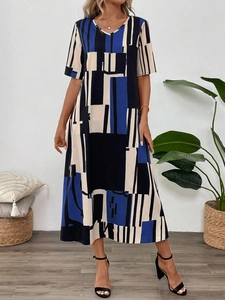 Detail of V-neck short sleeve dress with dark blue and beige geometric abstract print