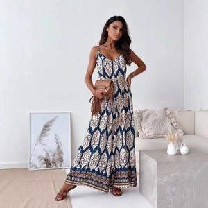 Women's V-neck paisley print jumpsuit with wide legs and belt in a bohemian style