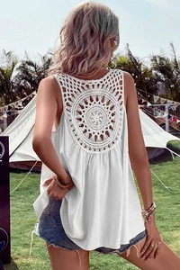 Close-up of bohemian white sleeveless top with detailed crochet lace cutout on back