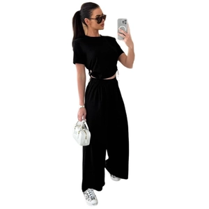 Damen 2-Teiler Set in Schwarz mit kurzem Crop Top und lockerer weit geschnittener Hose