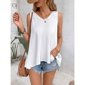 Close-up of white V-neck sleeveless top featuring pleated texture and airy summer style