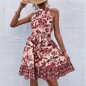Floral halter neck sleeveless summer dress with waist tie and ruffle hem detail