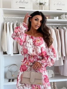 Detail of off-shoulder pleated floral top and matching long skirt in lightweight chiffon