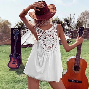 Bohemian white sleeveless top featuring intricate lace crochet hollow out back detail