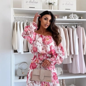 Pink off-shoulder floral pleated dress with long sleeves and smocked waist design