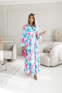 Detailed view of the long-sleeved floral print shirt dress with collar and waist belt