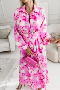 Detail of pink floral shirt dress featuring elastic lantern sleeves and waist tie
