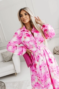 Detail view of pink floral midi dress featuring a lapel collar and matching waist belt