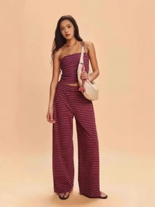 Chic women's two-piece set featuring purple striped tube top and high waist wide leg pants