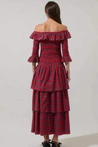 Vue arrière d'une robe écossaise rouge à smocks avec volants et jupe à plusieurs niveaux