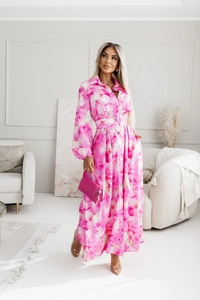 Detail of pink floral shirt dress with long sleeves and elegant A-line silhouette