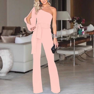Detail of pink one-shoulder jumpsuit with split long sleeves and elegant waist tie belt
