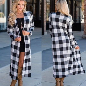 Detailed close-up of a long-sleeved black and white buffalo plaid cardigan for women