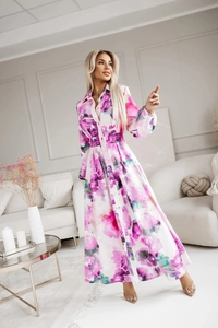 Close-up of lantern sleeves and floral print detail on an elegant long-sleeve dress