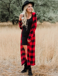 Detail shot of a long-sleeved red and black buffalo plaid cardigan for women