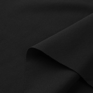 Close-up of black premium ribbed fabric texture showing detailed knit pattern and softness