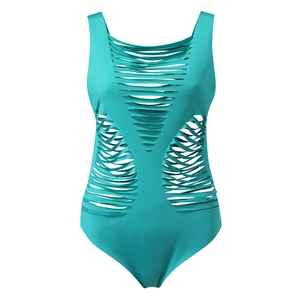 Detail of turquoise one-piece swimsuit featuring unique horizontal cutout slash design