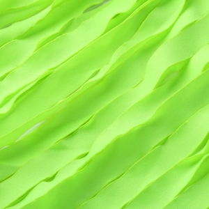Detail of neon green elastic knit fabric featuring layered ruffle texture and fine fibers