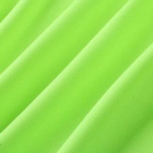 Close-up of neon green knit fabric showing detailed honeycomb mesh texture and soft drape