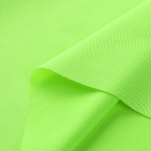 Detailed close-up of fluorescent green fine knit fabric showing soft texture and density