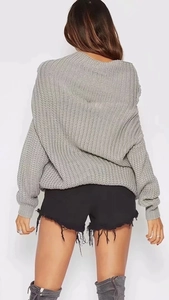 Back view of grey chunky knit sweater with drop shoulder and relaxed casual fit
