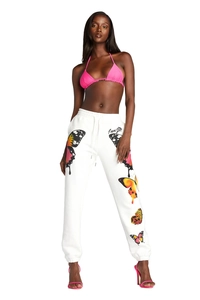 Detail of white cotton sweatpants with colorful butterfly print and pink bikini top