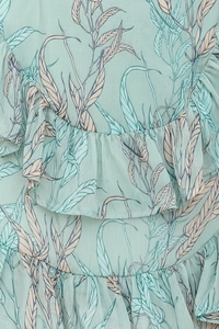 Detailed view of mint green floral chiffon dress with ruffled layers and leaf print