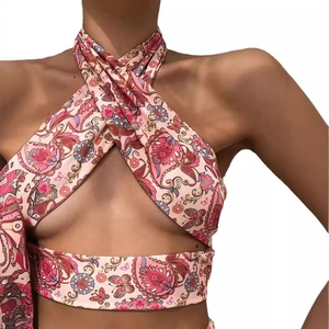 Pink paisley print halter neck crop top with a sexy criss-cross design for women
