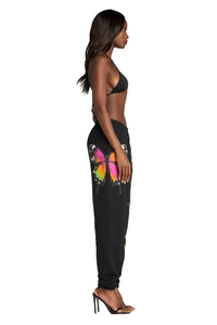 Detail of colorful butterfly print on black casual sweatpants for a trendy athletic look