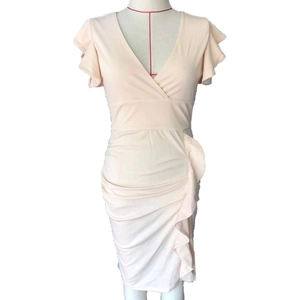 Detail of pink V-neck bodycon dress showing ruffled butterfly sleeves and side ruching