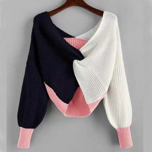 Three-color patchwork knit sweater with twist knot design and deep v-neckline