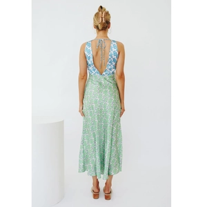 Sleeveless backless high waist maxi dress with color-block floral patterns and back tie