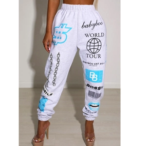Pantalon de jogging gris clair avec signes dollar bleus et motifs imprimés tour du monde
