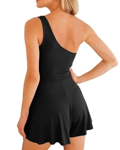 Back view of black one-shoulder romper featuring elastic fabric and waist detail