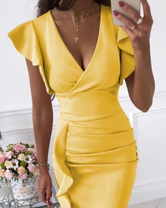 Detail of yellow deep V-neck dress with ruffle sleeves and pleated satin texture