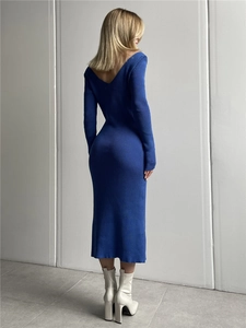 Detailed back view of a slim-fit royal blue knitted midi dress with V-back design