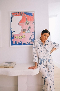 Artistic hand-painted line art print on a white long-sleeve linen shirt for women