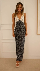 Detail of high-waist sleeveless maxi dress with contrast black and white floral print